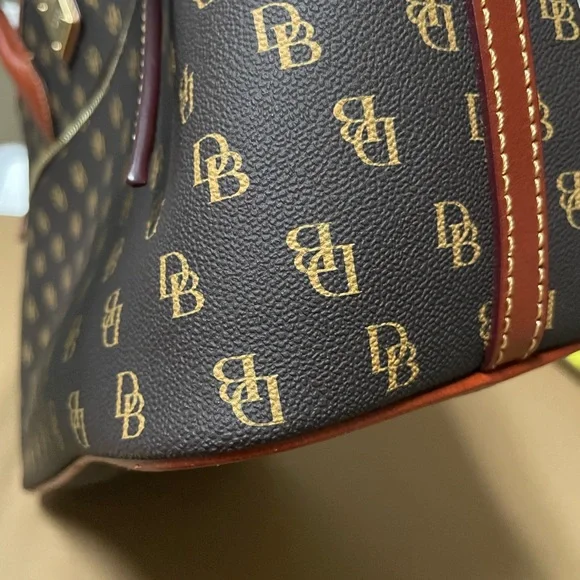 Beautiful Dooney and Bourke large purse with registration card. - Picture 15 of 16